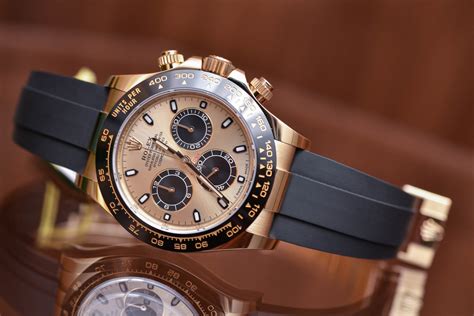 rolex daytona gold black dial rubber strap